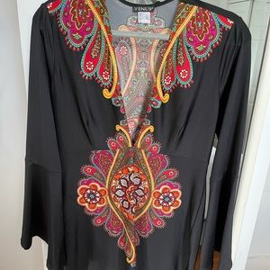 Beautiful low cut plunging neckline black dress with retro detail.